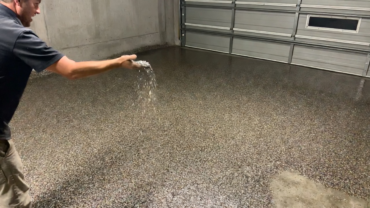 Full broadcast color flake epoxy floor in residential garage
